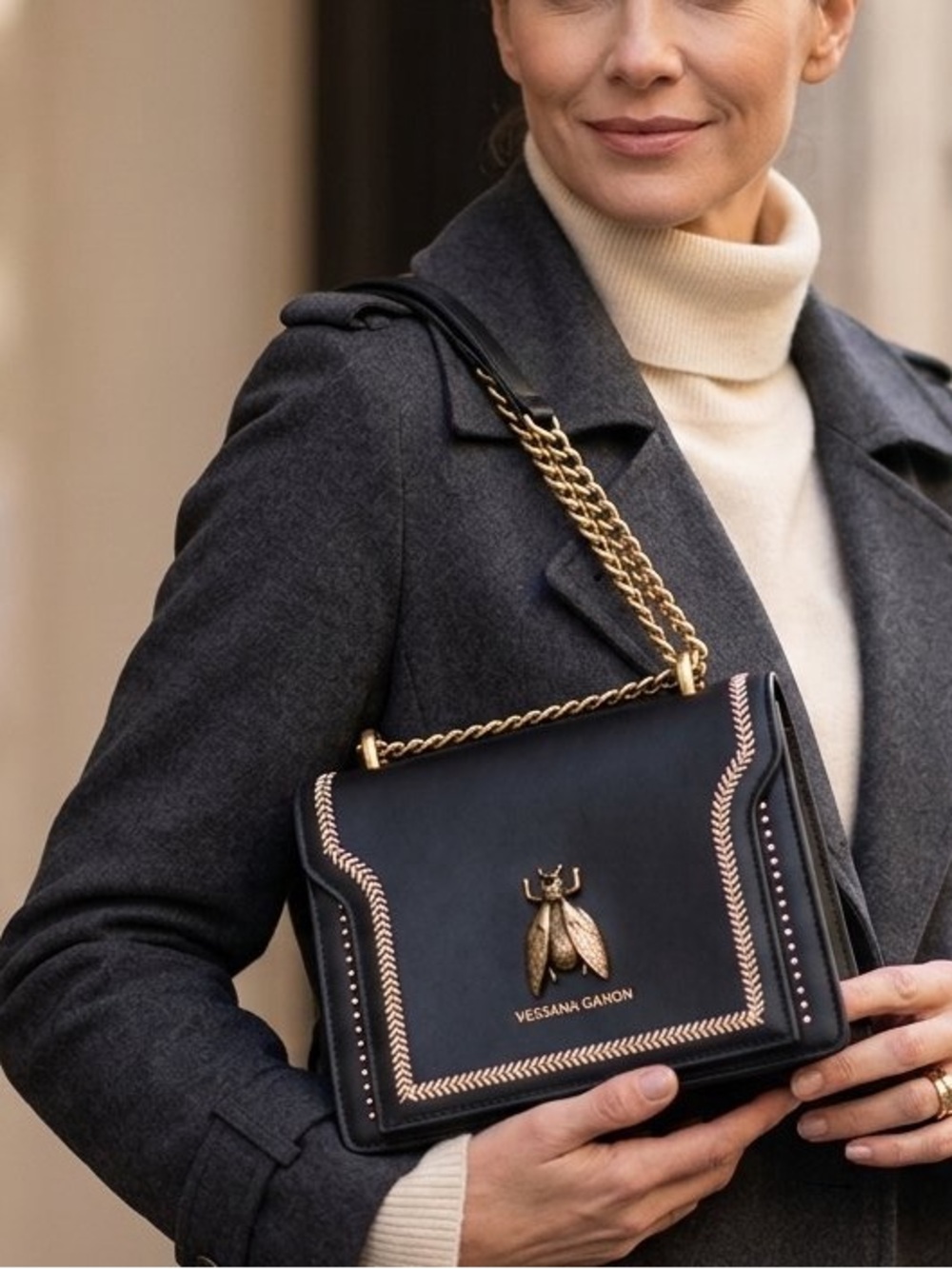 Black Leather Shoulder Bag with Gold Bee Accent
